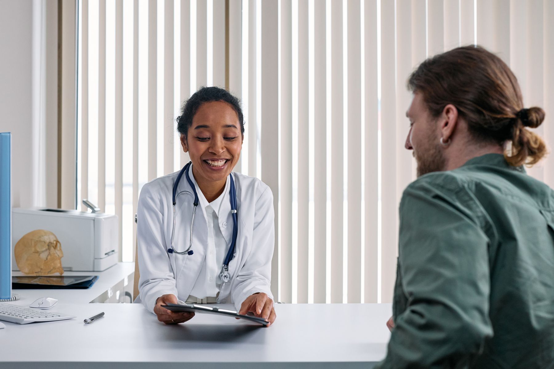 Doctor and patient talking during a consultation